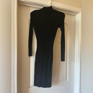 Small black sweater dress. Tags still on. Never worn